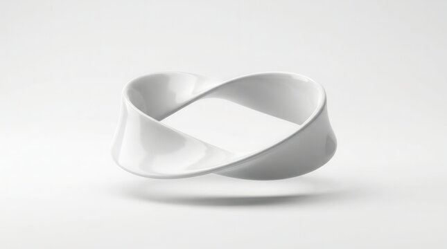 White Mobius strip isolated on a clean background, representing infinity and continuity.