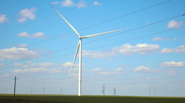 Observe the impressive functionality of a wind turbine as it turns effortlessly, generating electricity from the wind. This video highlights the importance of wind energy in creating a sustainable fut