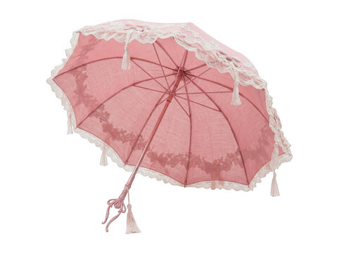 Vintage pink lace parasol with decorative ruffles and tassels isolated on a white background