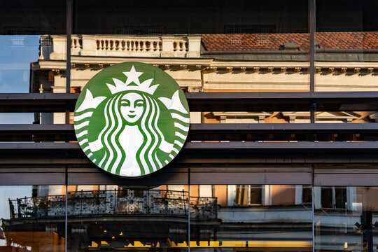Starbucks storefront logo with architectural reflections in Belgrade, Serbia, August 20, 2026