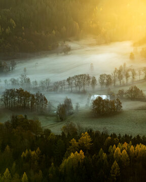 A view of the autumn landscape of the Sudetes Mountains in Poland. A mountain valley at sunrise in autumn. The Rudawy Janowickie Mountains in autumn. The Jelenia Gora Valley in Silesia in autumn.