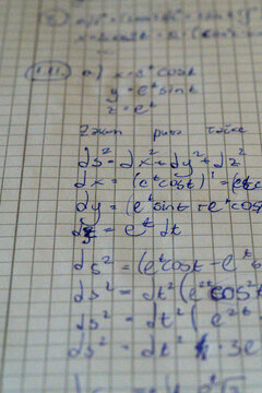 Macro close-up handwritten differential geometry equations
