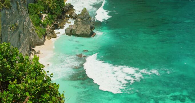 Magnificent view of tropical Diamond beach and turquoise ocean waves in Nusa Penida Bali