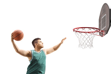 Basketball jumping with a ball in front of a hoop © Ljupco Smokovski