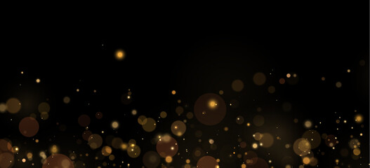 Soft glowing golden bokeh lights scattered across a dark background with varying sizes and gentle blur effects on transparent background © svetilo