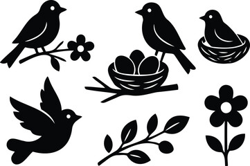 Fototapeta premium Black and white of a collection of crows perched on branches and flying black crow white background crows in flight