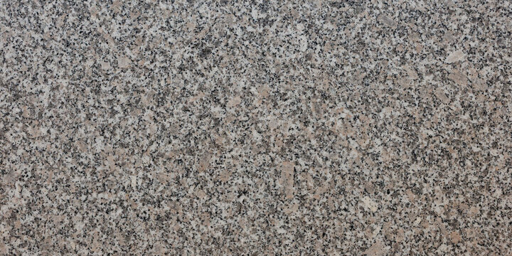 Gray beige granite texture with speckled pattern natural stone background