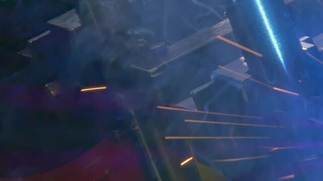 Close-up shots reveal power of industrial argon welding robot. Sparks fly as robot skillfully bonds metal pipes together in seamless and precise manner, showcasing advanced technology in action.