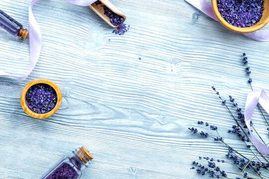 organic cosmetics with lavender on wooden background top view