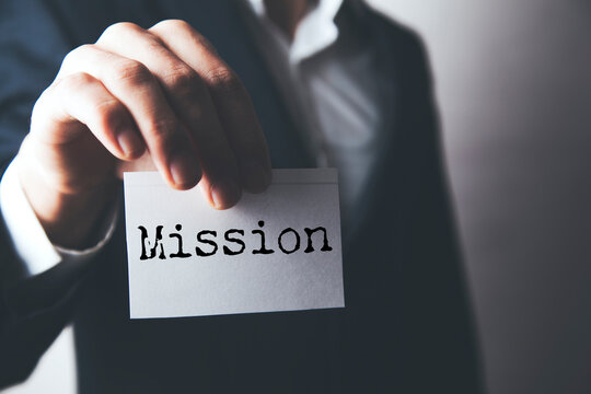 Torn paper with word Mission