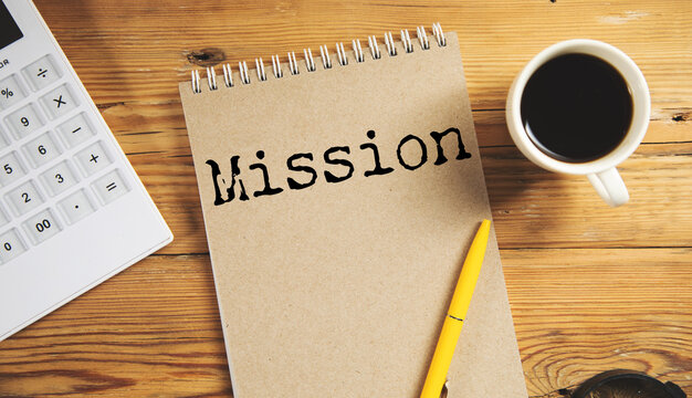 Torn paper with word Mission