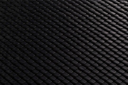 High-angle architectural pattern photograph of dark grey Giwa roof tiles