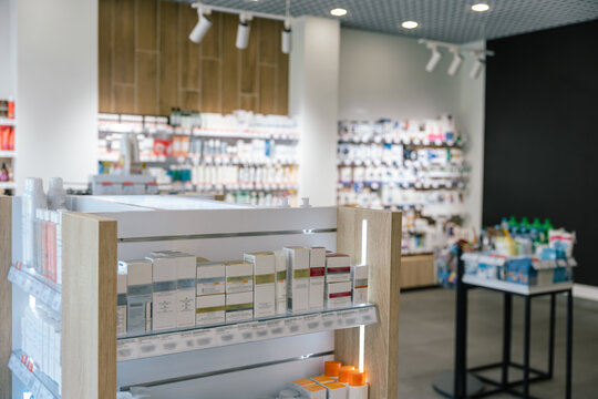 Picture of a pharmacy with lots of medicines on the shelves
