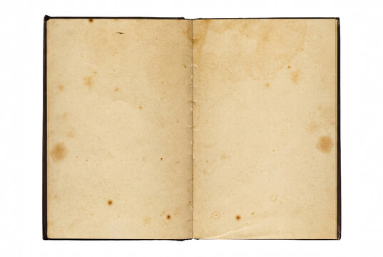 Old Open Book With Yellowed Stained Pages And Foxing Spots