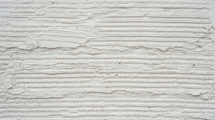 Fototapeta premium White stucco wall texture with horizontal ridges and grain