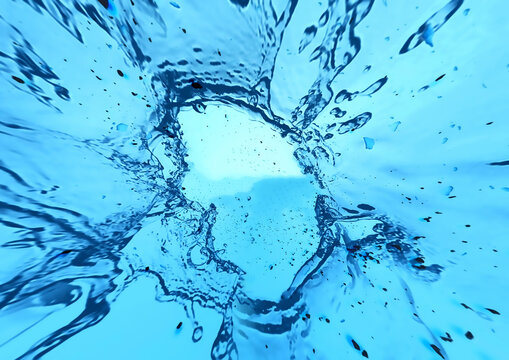 動きのある青い水しぶきと透明感のある抽象背景