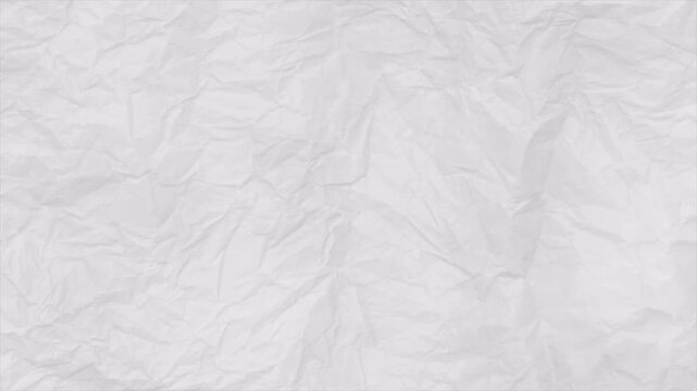 Abstract ink brush stroke texture on white paper background.
