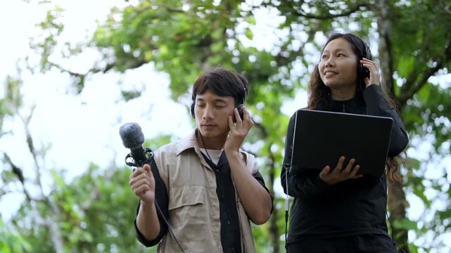 Nature Sound Recordists Listening and Capturing Forest Ambience with Microphone