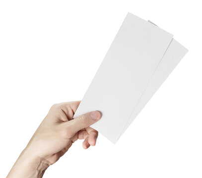 Hand holding two blank paper tickets, isolated on transparent cutout background