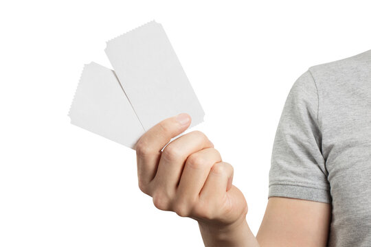 Hand holding two blank tickets, isolated on transparent cutout background