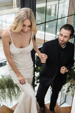 A beautiful couple embraces their love, celebrating an engagement