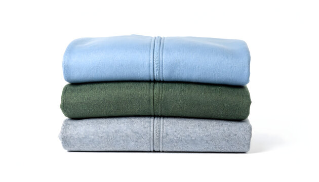Tidy stack of three folded fleece jackets resting on surface evoking cosy and inviting mood generative AI