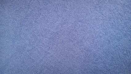 ​Close-up texture of soft blue fleece fabric background © Reni