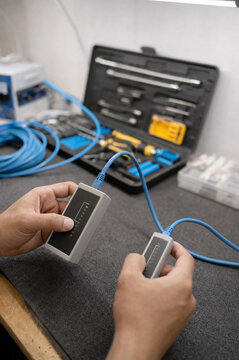 Network technician toolkit with cables and diagnostic equipment