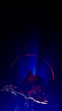 Dark Fantasy Motion Background of Warlock Silhouetted by Blue and Red Portal