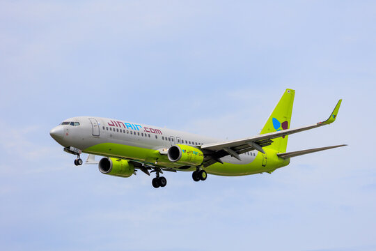 Fukuoka, Japan - August 8, 2026: Jin Air Boeing 737-800 (HL8242) on final approach against a clear blue sky