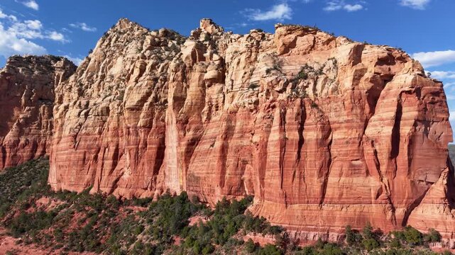 Dramatic Pull away aerial shot of the Giant Red Rock formations of Sedona Arizona.Beautiful detailed cinematic footage of this beautiful National Park. js
