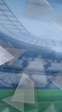 Animation of failing shapes and glowing lights over football stadium