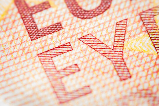 Euro currency extreme close up of 10 euro banknote. Detailed European money texture. Selective focus. Shallow depth of field. Extreme macro.