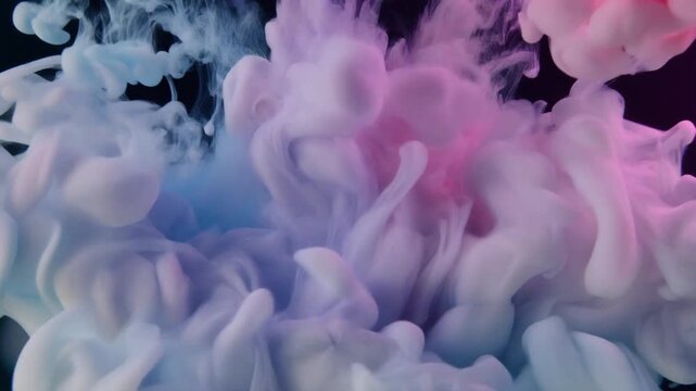 Abstract colorful ink clouds blooming in dark water with gentle motion and soft lighting