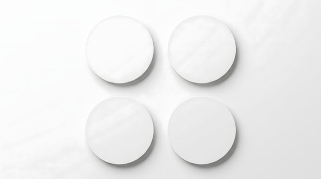 Four blank white circles arranged in square grid for graphic label design.