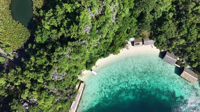 Top Down Aerial View of White Sand Beach with Crystal Clear Turquoise Water in Coron Palawan Philippines