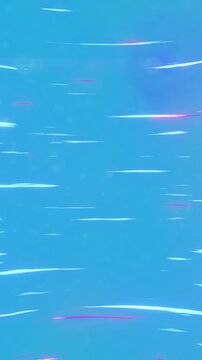Animation of light trails moving on blue background