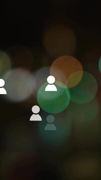 Animation of social media icons over light spots on black background