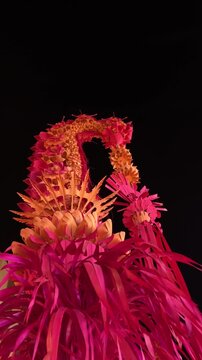 Red Tinted Penjor Bali at Night Celebration of Galungan Kuningan in the Dark Place Traditional Ceremony Indonesia