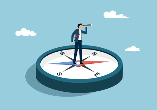 Businessman standing on compass searching for business investment opportunity