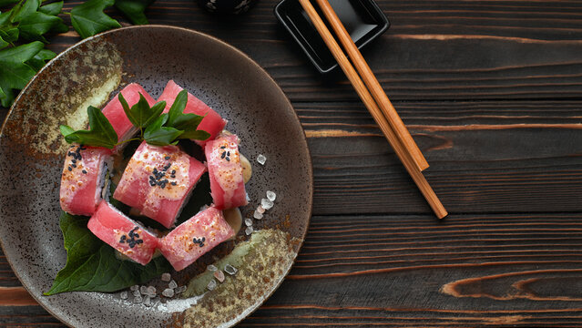 Tuna sushi rolls top view plate