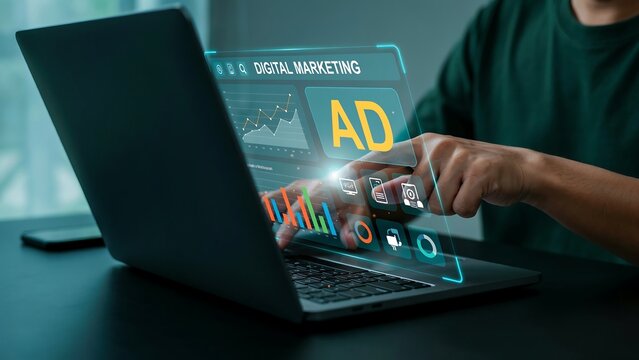 Professional manages online advertising campaigns on laptop computer using glowing digital marketing HUD interface displaying campaign analytics and performance charts.