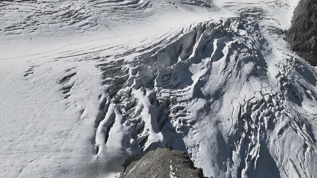 Aerial Close-Up View of Steingletscher Glacier Crevasses and Ice Formations in Swiss Alps, Switzerland