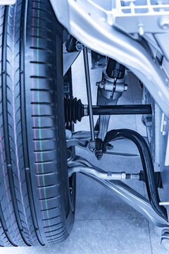 electric system of eco car front driving axle in the car, visible elements of the steering system