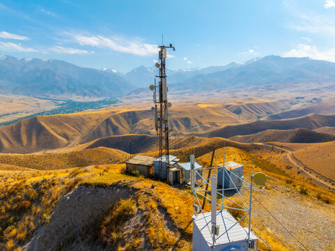 Aerial View of Communication Tower on Arid Hilltop