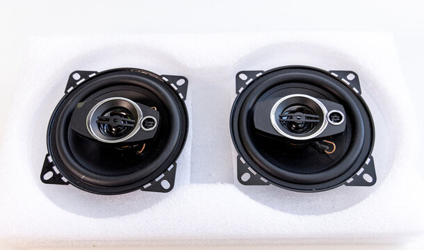 Pair of New Car Speakers in Protective Foam Packaging