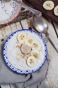 Smoothie bowl of banana, curd cheese, lemon juice and tigernut powder