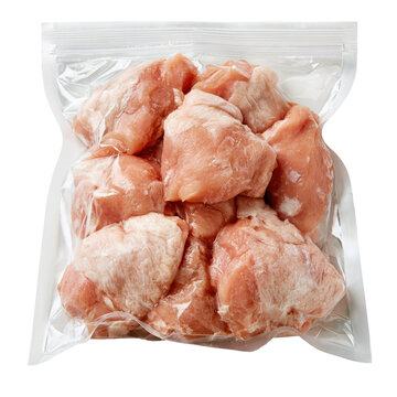 Frozen chicken in a vacuum sealed bag on a white background ready for cooking or storage