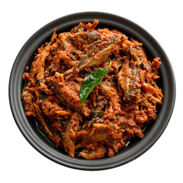 Bold and flavorful shutki curry made with dried fish served in a black bowl on a white surface