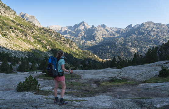 Female hiker on the famous Haute Randonn&eacute;e Pyr&eacute;n&eacute;enne trail in France.